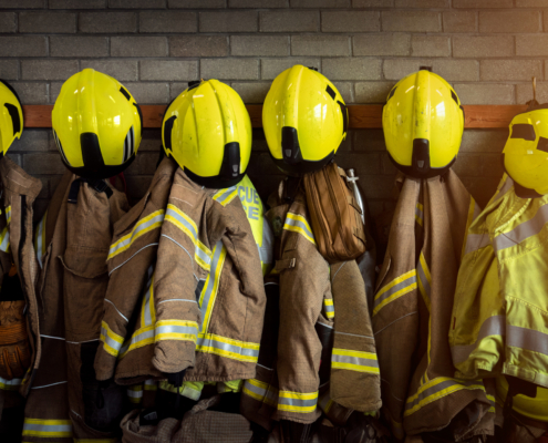Firefighting gear including helmets, gloves, protection jacket and trousers